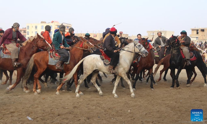 Afghan horse riders compete in a Buzkashi game in Balkh province, Afghanistan, Nov. 22, 2024.

Buzkashi, or goat grabbing, is a kind of traditional sport in Afghanistan. In this game, two teams of horsemen compete to grab a goat carcass and carry it through a goal. (Photo: Xinhua)