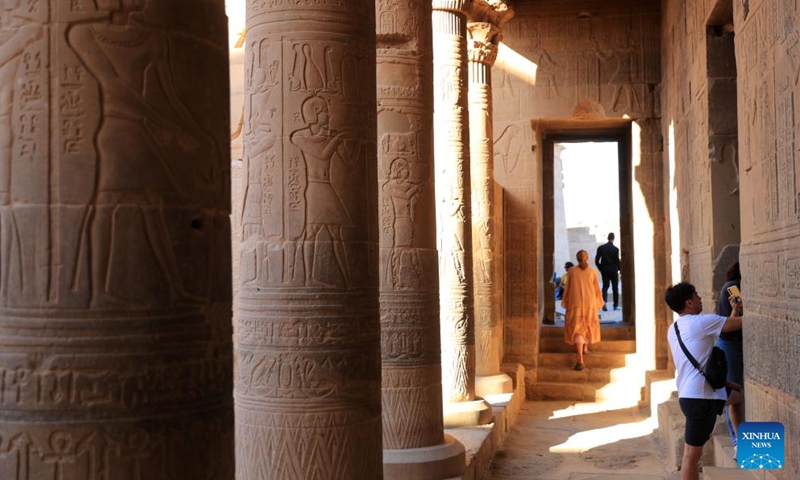 Tourists visit the Philae temple complex in Aswan, Egypt, Nov. 22, 2024. (Photo: Xinhua)