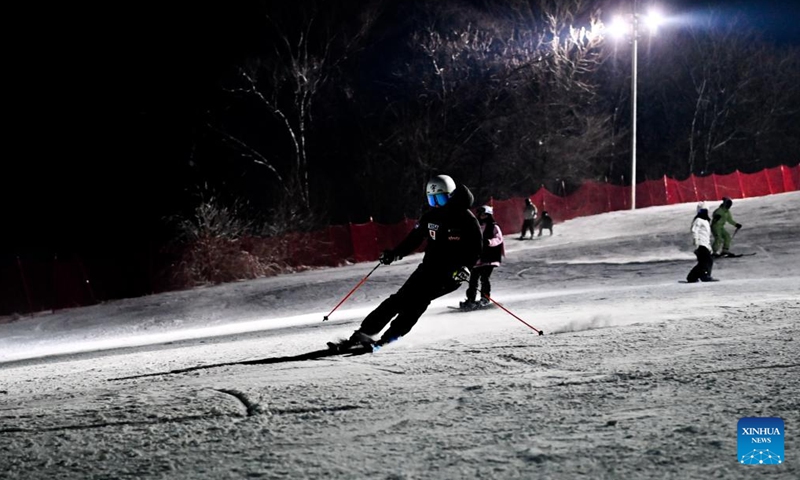 A skier enjoys the sport at the Wanke Songhua Lake Ski Resort in Jilin City, northeast China's Jilin Province, on Nov. 22, 2024. Following the recent snowfall and drop in temperature, a new ski season has kicked off in northeast China's Jilin Province. (Photo: Xinhua)