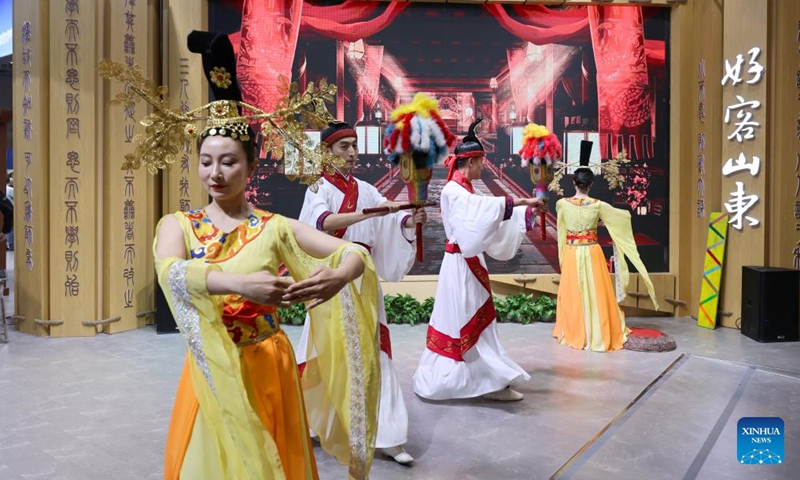 Dancers perform at the booth of east China's Shandong Province during the China International Travel Mart 2024 in east China's Shanghai, Nov. 22, 2024. (Photo: Xinhua)