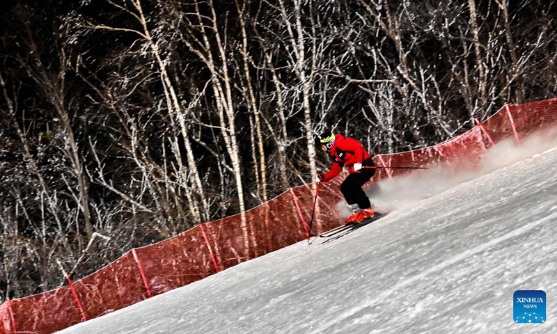 A skier enjoys the sport at the Wanke Songhua Lake Ski Resort in Jilin City, northeast China's Jilin Province, on Nov. 22, 2024. Following the recent snowfall and drop in temperature, a new ski season has kicked off in northeast China's Jilin Province. (Photo: Xinhua)