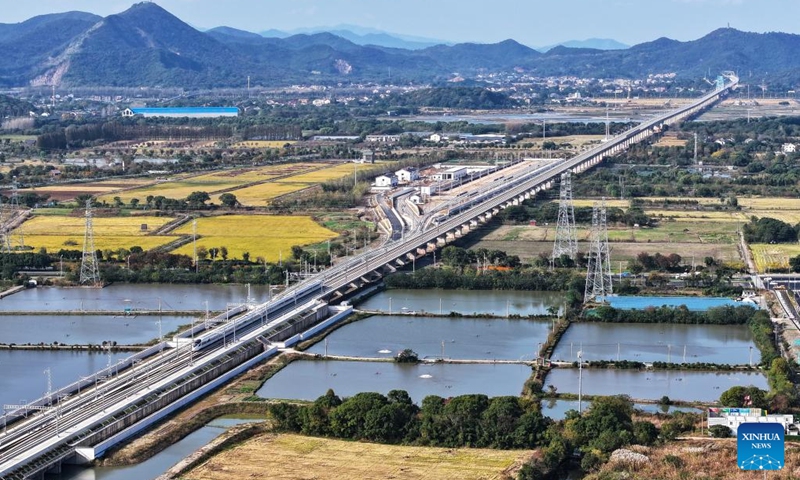 An aerial drone photo taken in Huzhou, east China's Zhejiang Province on Nov. 23, 2024 shows the bullet train No. G55505 running on a new high-speed rail line connecting Shanghai Municipality with the provinces of Jiangsu and Zhejiang in east China. (Photo: Xinhua)