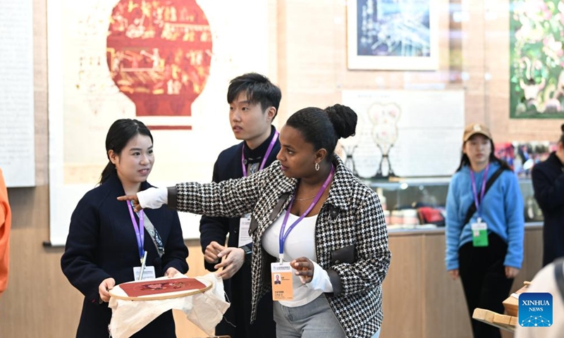 Kalkidan (3rd L) visits the 2024 World Vocational and Technical Education Development Conference in Tianjin, north China, Nov. 22, 2024. (Photo: Xinhua)