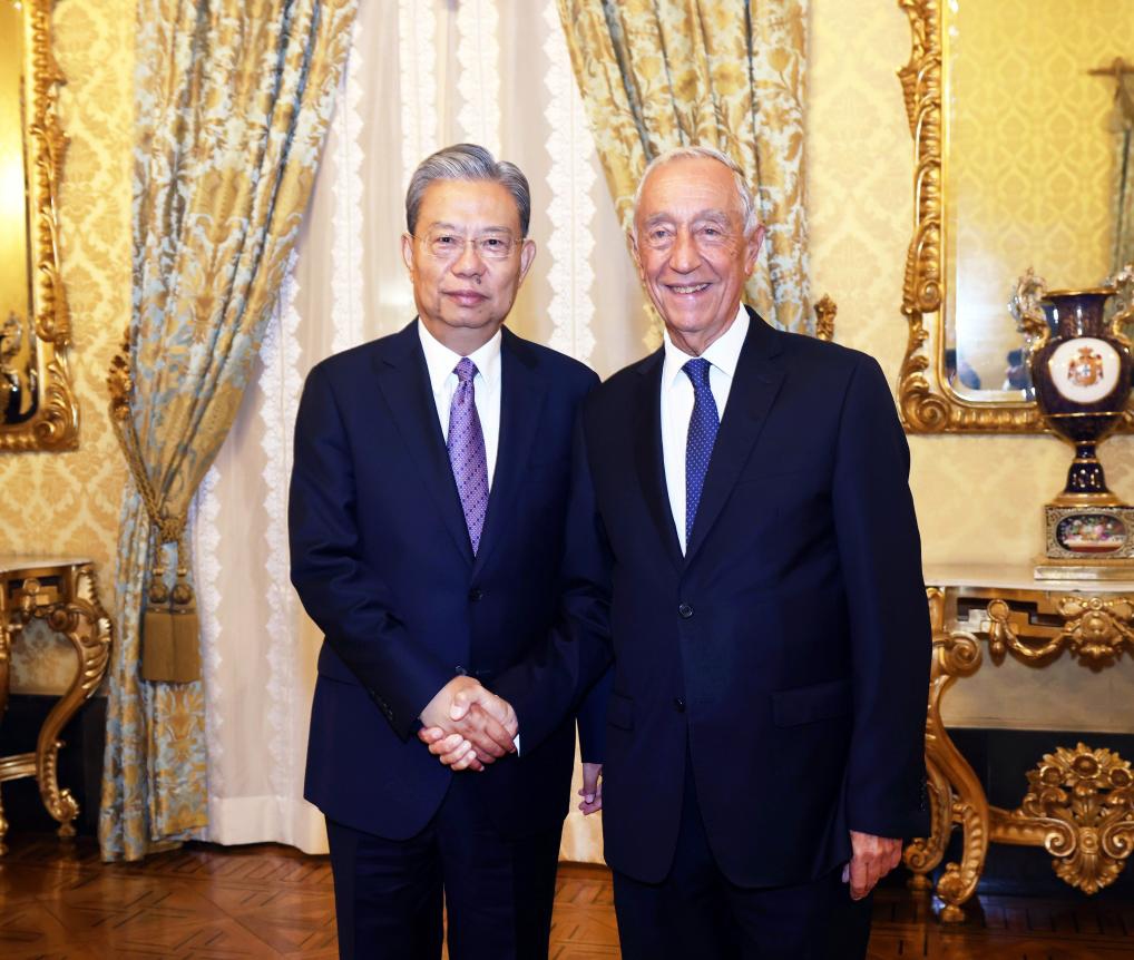 Zhao Leji, chairman of the National People's Congress Standing Committee, meets with Portuguese President Marcelo Rebelo de Sousa in Lisbon, Portugal, Nov. 21, 2024. Zhao paid an official goodwill visit to Portugal from Nov. 21 to 23 at the invitation of Jose Pedro Aguiar-Branco, speaker of the Portuguese Parliament. (Xinhua/Liu Weibing)