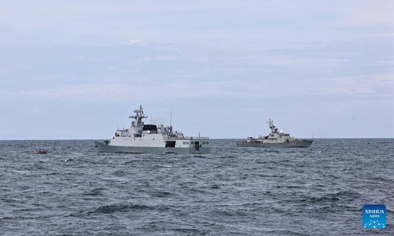 Chinese and Vietnamese navies conduct a search and rescue drill during the 36th joint patrol of Chinese and Vietnamese navies in Beibu Gulf in the South China Sea, June 26, 2024. (Photo by Li Zhengsong/Xinhua)