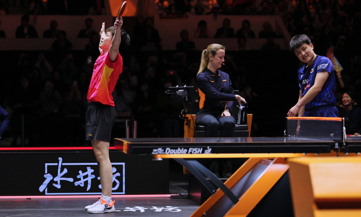 Chinese paddler Wang Chuqin (left) celebrates victory over Japan's Tomokazu Harimoto at the WTT Finals Fukuoka 2024 in Kitakyushu, Japan, on November 24, 2024. Photo: VCG