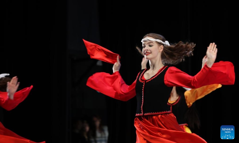 A dancer performs during the international ballet and contemporary dance festival-competition ALLEGRO 2024 in Vilnius, Lithuania, on Nov. 23, 2024. Hundreds of dancers from Lithuania, Latvia and other countries will compete in the event held here from Nov. 23 to 24. (Photo by Yang Weihua/Xinhua)