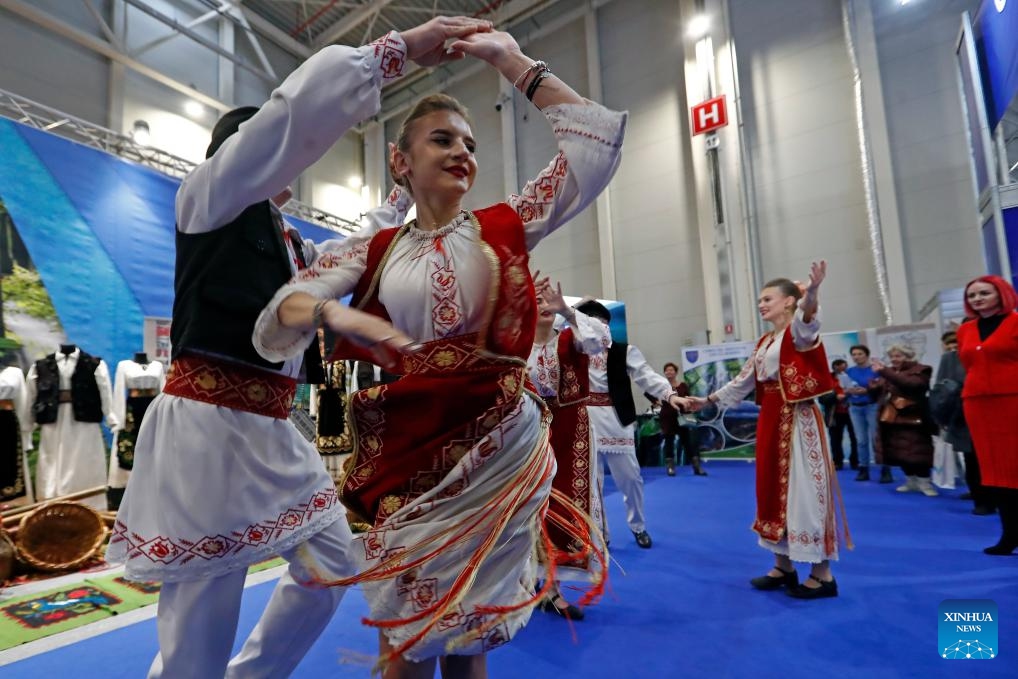 Dancers perform at the autumn edition of Romania's Tourism Fair in Bucharest, Romania, Nov. 22, 2024. China's stand attracted visitors at the Romania's Tourism Fair, which is held here from Nov. 21-24, as China has expanded its visa-free policy to nine additional countries including Romania, allowing their citizens to enter for up to 30 days without a visa for business, tourism, and other visits starting Nov. 30, 2024. (Photo by Cristian Cristel/Xinhua)