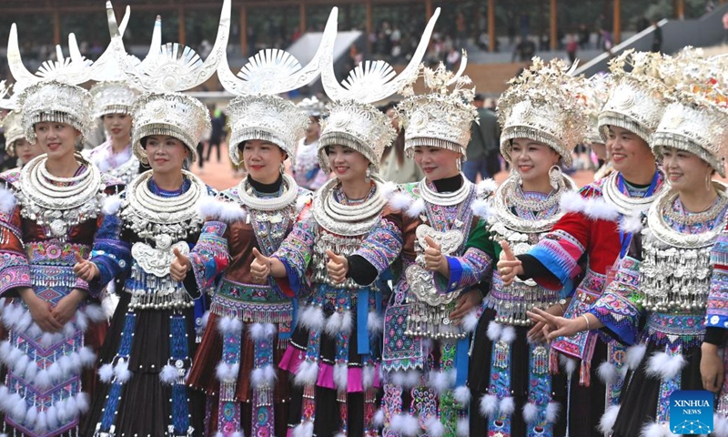 People in traditional costumes participate in Lusheng and horse fighting festival held in Rongshui Miao Autonomous County of Liuzhou, south China's Guangxi Zhuang Autonomous Region, Nov. 23, 2024. Lusheng is a folk musical instrument made of bamboo pipes. (Xinhua/Huang Xiaobang)