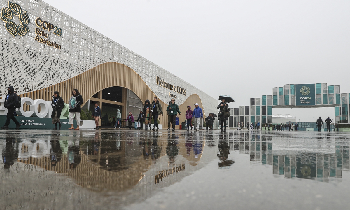 Participants arrive at the COP29 venue in Baku, Azerbaijan, on November 18, 2024. Photo: IC