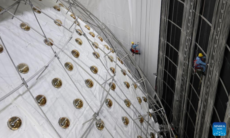 Staff members work at the construction site of the Jiangmen Underground Neutrino Observatory (JUNO) in Jiangmen, south China's Guangdong Province, Nov. 22, 2024.(Xinhua/Jin Liwang)