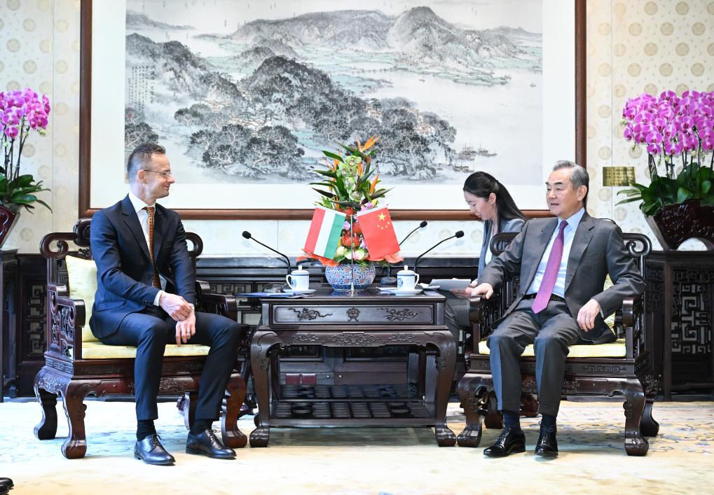 Chinese Foreign Minister Wang Yi, also a member of the Political Bureau of the Communist Party of China Central Committee, holds talks with Hungarian Minister of Foreign Affairs and Trade Peter Szijjarto in Beijing, capital of China, Nov. 26, 2024. (Xinhua/Li Xiang)