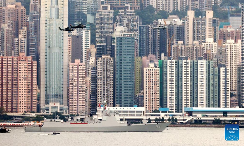 The Changsha missile destroyer leaves the dock of Stonecutters Island in Hong Kong, south China, Nov. 25, 2024. A Chinese People's Liberation Army Navy fleet comprising the Hainan amphibious assault ship and the Changsha missile destroyer visited Hong Kong from Nov. 21 to 25. (Photo: Xinhua)