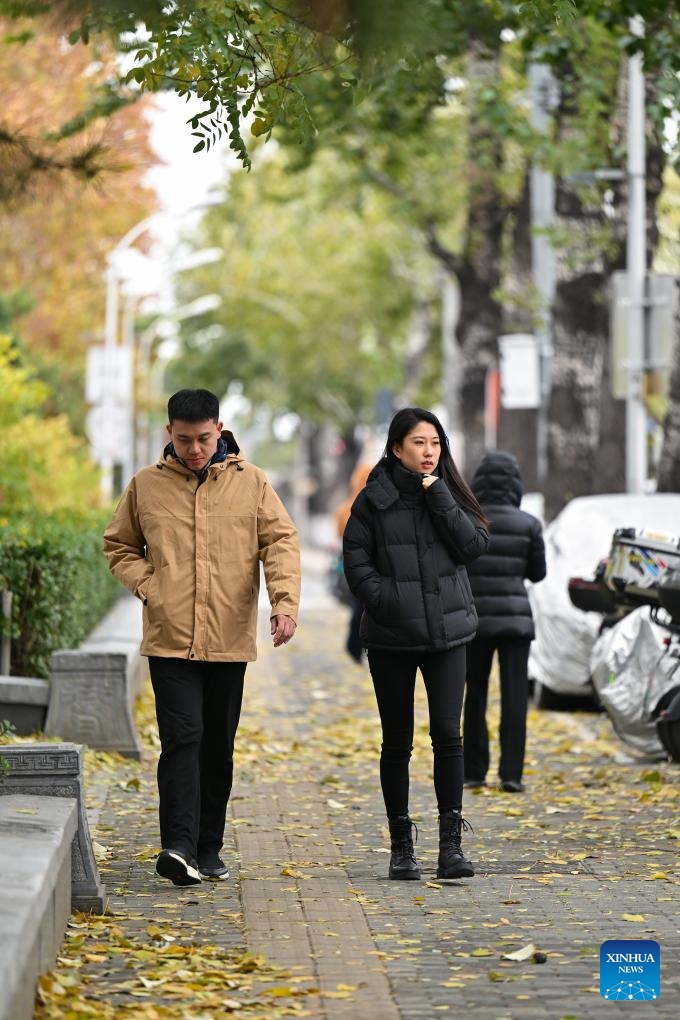 Pedestrians walk on a street in Beijing, capital of China, Nov. 25, 2024. (Photo: Xinhua)