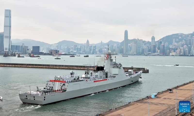 The Changsha missile destroyer leaves the dock of Stonecutters Island in Hong Kong, south China, Nov. 25, 2024. A Chinese People's Liberation Army Navy fleet comprising the Hainan amphibious assault ship and the Changsha missile destroyer visited Hong Kong from Nov. 21 to 25. (Photo: Xinhua)