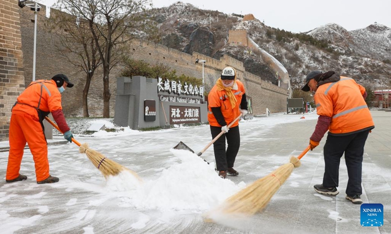 Sanitation workers clear snow in Zhangjiakou, north China's Hebei Province, Nov. 25, 2024. (Photo: Xinhua)