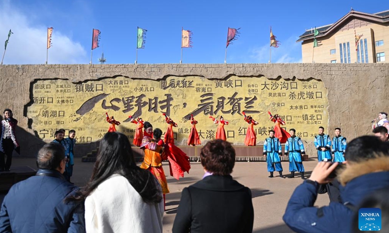 A performance is staged to welcome tourists at an immersive performing arts town in Xixia District of Yinchuan, northwest China's Ningxia Hui Autonomous Region, Nov. 25, 2024. (Photo: Xinhua)