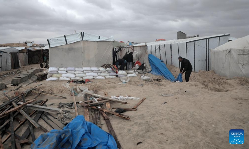 Sandbags are piled up to prevent flood in the Mawasi area of Khan Younis, southern Gaza Strip, on Nov. 25, 2024. UN humanitarians said on Monday they and their partners have been evaluating flood damage in a response to multiple sites for displaced Gazans hit by heavy weekend rainfall. (Photo: Xinhua)