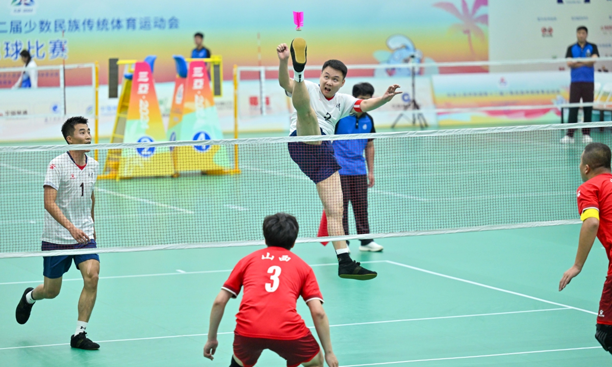 Players compete in a shuttlecock competition at the 12th National Traditional Games of Ethnic Minorities in Sanya, Hainan Province on November 28, 2024. Photo: VCG 