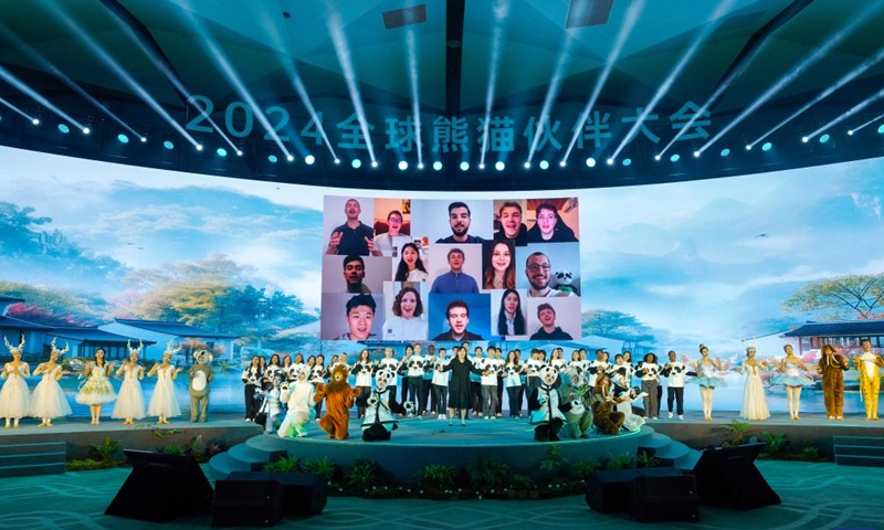 Performers stage a chorus during the Global Panda Partners 2024 conference in Chengdu, southwest China's Sichuan Province, Nov. 26, 2024. (Photo: Xinhua)