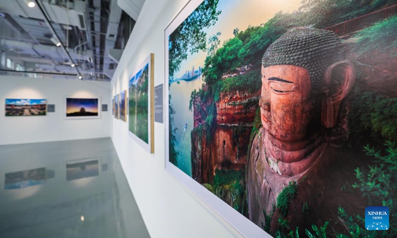 This photo taken on Nov. 25, 2024 shows the exhibits displayed on a photography exhibition themed on China's world heritage in Hangzhou, east China's Zhejiang Province. The exhibition held here on Monday presents China's 59 sites that have been inscribed on the UNESCO World Heritage List. (Photo: Xinhua)