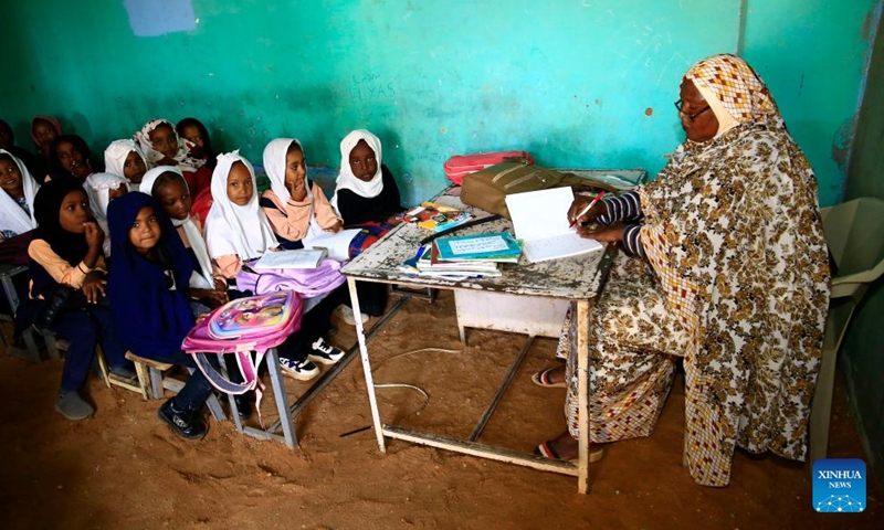 Children attend a class at a school in Al-Iskan, north of Omdurman, Sudan, on Nov. 25, 2024. More than 15 million children in Sudan are out of school due to the country's ongoing conflict. In relatively safe areas of Omdurman, some schools resumed classes on Monday.(Photo: Xinhua)