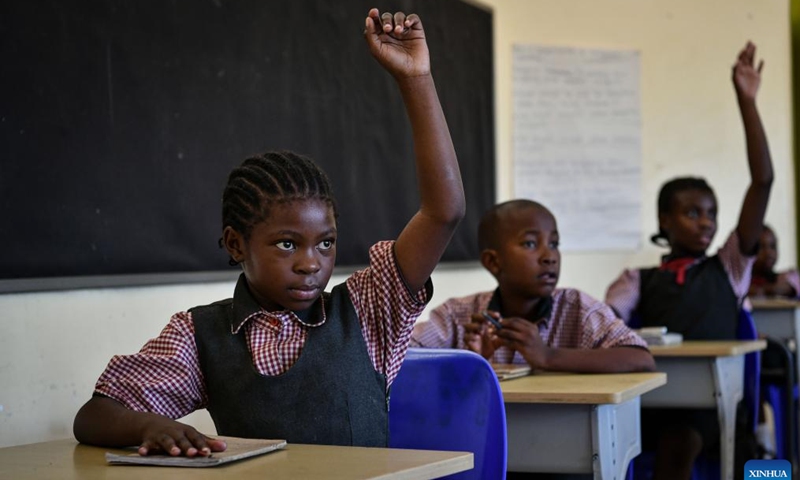 Pradence Tshepi (L) attends a class at China-aided Mmopane Primary School in Mmopane, Kweneng District, Botswana, Nov. 4, 2024. (Photo: Xinhua)