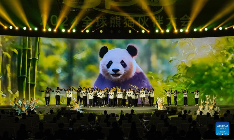 Performers stage a chorus during the Global Panda Partners 2024 conference in Chengdu, southwest China's Sichuan Province, Nov. 26, 2024. (Photo: Xinhua)