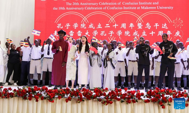 Students and teachers perform during the 10th anniversary celebration of Confucius Institute at Makerere University in Kampala, Uganda, on Nov. 25, 2024. (Photo: Xinhua)