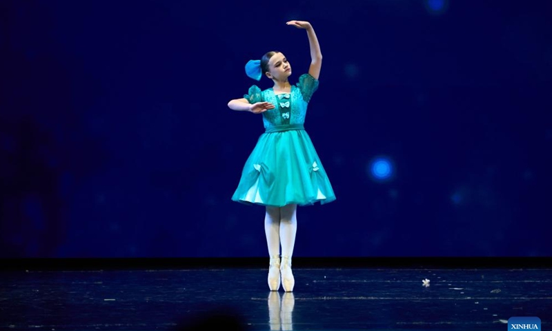 A dancer performs on stage during the 31st Far East Dance Competition in Vladivostok, Russia, Nov. 29, 2024. More than 200 groups from Russia's Far East region participated in the competition, showcasing various forms of dance, such as Russian traditional dance, ethnic dance, modern dance, etc. (Photo: Xinhua)