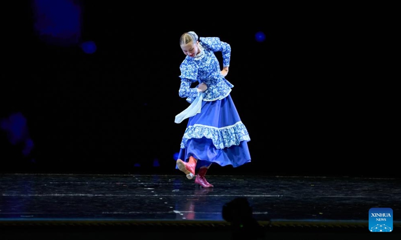 A dancer performs on stage during the 31st Far East Dance Competition in Vladivostok, Russia, Nov. 29, 2024. More than 200 groups from Russia's Far East region participated in the competition, showcasing various forms of dance, such as Russian traditional dance, ethnic dance, modern dance, etc. (Photo: Xinhua)