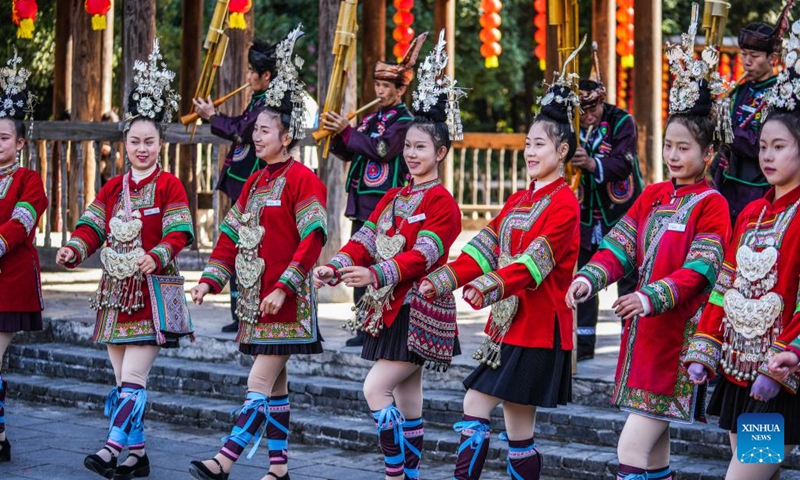 People of Dong ethnic group dance as they celebrate Dongnian festival in Zhaoxing Dong village of Liping County in Qiandongnan Miao and Dong Autonomous Prefecture, southwest China's Guizhou Province, Nov. 29, 2024. Dongnian festival, a traditional festival for harvest and gathering, was enlisted as one of China's national intangible cultural heritages in 2011. (Photo: Xinhua)