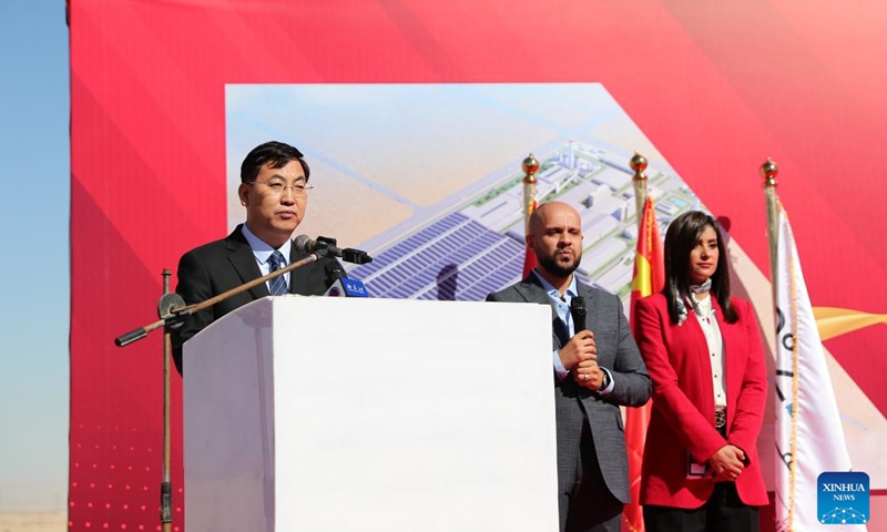 Cai Guo (L), vice president of China Glass Holdings Co., Ltd., speaks at a groundbreaking ceremony in the China-Egypt TEDA Suez Economic and Trade Cooperation Zone (TEDA), approximately 120 km east of Cairo, Egypt, Nov. 28, 2024.(Xinhua/Wang Dongzhen)