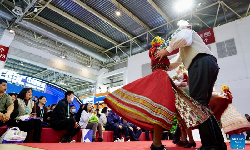 People watch a Hungarian traditional performance at the Hungary Pavilion of the second China International Supply Chain Expo in Beijing, China, Nov. 28, 2024. This year's expo has Hungary as its guest country of honor. The Hungary Pavilion showcases Hungary's leading industries, unique resources, cultural heritage, beautiful landscapes and national brand image. (Photo by Na Yuqi/Xinhua)