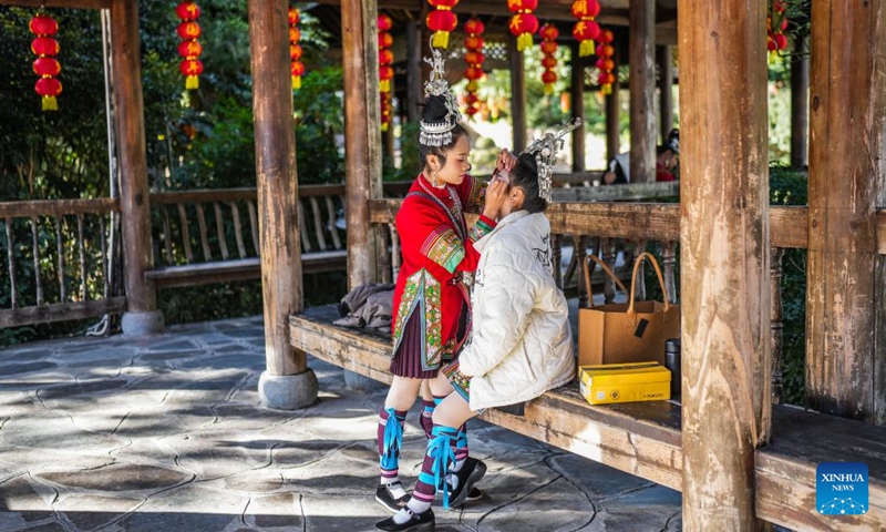 People of Dong ethnic group prepare for celebrations of Dongnian festival in Zhaoxing Dong village of Liping County in Qiandongnan Miao and Dong Autonomous Prefecture, southwest China's Guizhou Province, Nov. 29, 2024. (Photo: Xinhua)