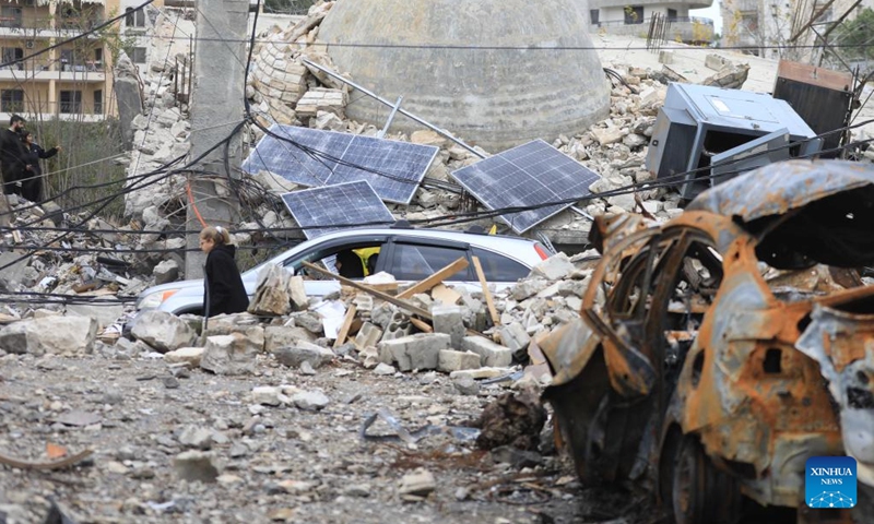 Lebanese returnees are seen among rubble in Nabatieh, Lebanon, on Nov. 28, 2024. (Photo: Xinhua)