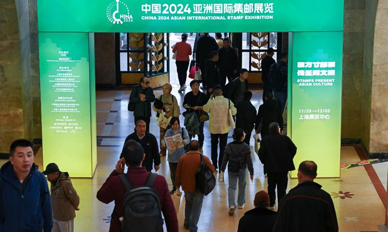 People visit China 2024 Asian International Stamp Exhibition at Shanghai Exhibition Center in east China's Shanghai on Nov. 29, 2024. The exhibition opened on Friday and will last for 5 days. (Photo: Xinhua)