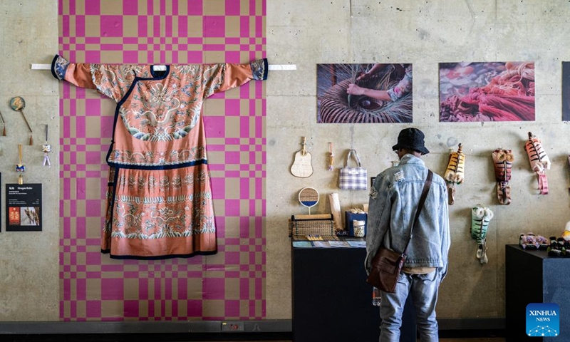 A visitor views the exhibits during the Belt and Road International Handicraft Art Exhibition at University of Johannesburg Art Gallery in Johannesburg, South Africa, Nov. 29, 2024. The first stop of the Belt and Road International Handicraft Art Exhibition, themed Dialogue with World Cultures, opened here on Friday. Photo: Xinhua