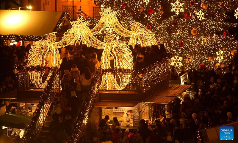 People visit a Christmas market at the Old Town Square in Prague, the Czech Republic, on Nov. 30, 2024. Photo: Xinhua