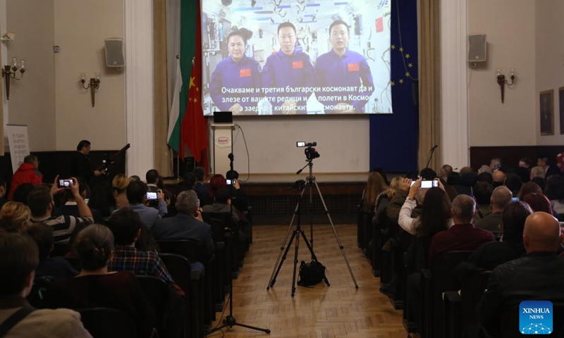 Cai Xuzhe (C, on screen), Song Lingdong (R, on screen), and Wang Haoze (L, on screen), members of the Shenzhou-19 crewed spaceflight mission, speak via video link during the Talking with Taikonauts event in Sofia, Bulgaria, Nov. 30, 2024. Three Chinese astronauts, or taikonauts, connected with Bulgarian youth via video link on Saturday, sharing their experiences in space exploration and answering questions about life aboard the Tiangong space station. Photo: Xinhua