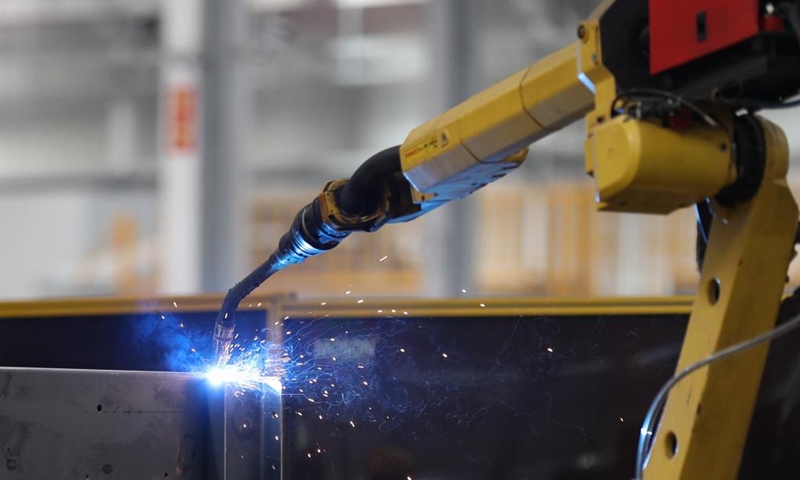 This photo taken on Nov. 29, 2024 shows a smart welding robot at a local company in Chenzhou City, central China's Hunan Province. In recent years, central China's Hunan Province has continuously utilized its manufacturing strengths to develop its agricultural machinery industrial chains, accelerating its transformation from traditional agriculture to modern agriculture. Photo: Xinhua