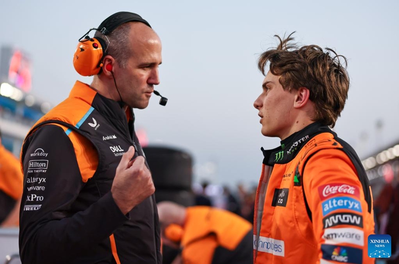 McLaren's Australian driver Oscar Piastri (R) is seen prior to the Sprint Race of the Qatar Grand Prix at Lusail International Circuit in Lusail, Qatar, on Nov. 30, 2024. Photo: Xinhua