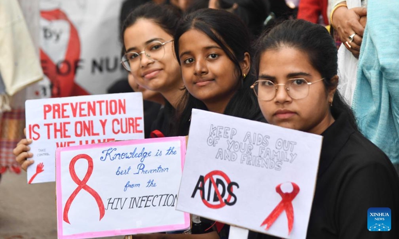 Students hold placards as they attend an awareness rally on the occasion of World AIDS Day in Guwahati city of India's northeastern state of Assam, Dec. 1, 2024. Photo: Xinhua