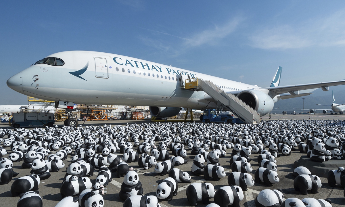 Some of the 2,500 panda sculptures are displayed at the Hong Kong International Airport during the welcome ceremony of the panda-themed exhibition 