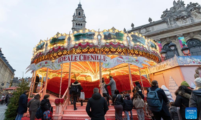 People visit the Christmas market in Lille, north France, Nov. 30, 2024. Photo: Xinhua