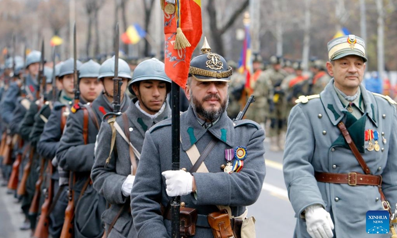 Soldiers wearing vintage uniforms prepare for a military parade celebrating Romania's National Day in Bucharest, Romania, on Dec. 1, 2024. Photo: Xinhua