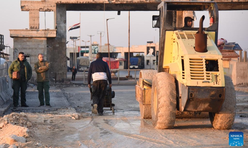 A road roller is at work near the reopened Al-Arida border crossing connecting Lebanon and Syria on Nov. 30, 2024. Israeli warplanes carried out airstrikes targeting 10 official and unofficial border crossings between Syria and Lebanon after midnight Wednesday, Syrian state media and monitoring groups reported. Photo: Xinhua