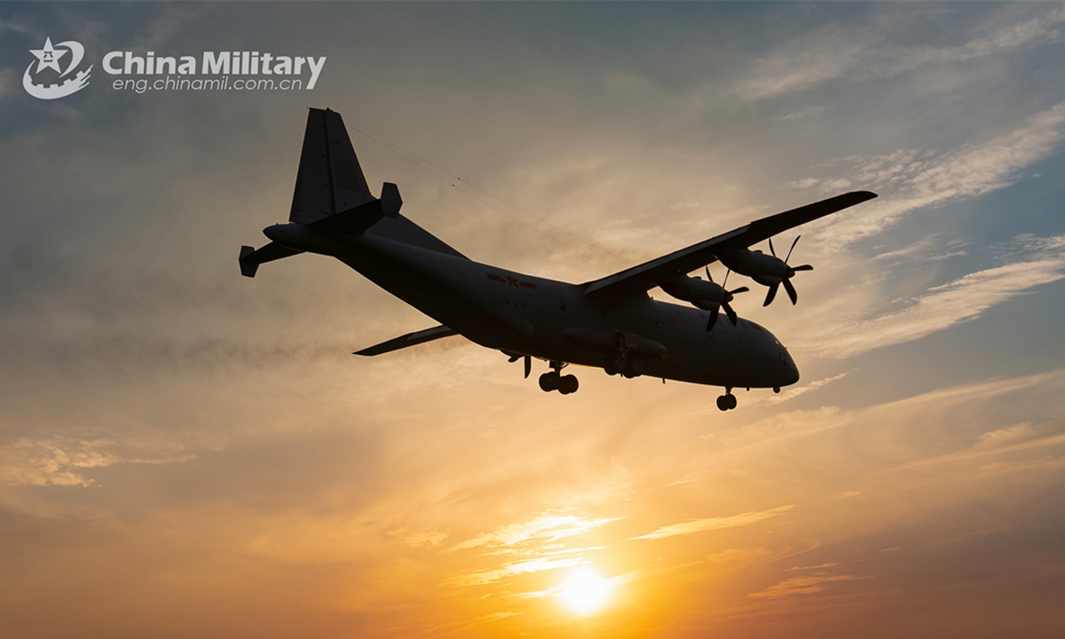 A Y-9 medium-lift transport aircraft attached to a naval aviation division under the Chinese PLA Eastern Theater Command unfolds its landing gears to prepare for landing during a flight training exercise on November 4, 2024. (eng.chinamil.com.cn/Photo by Yu Mingzhe)