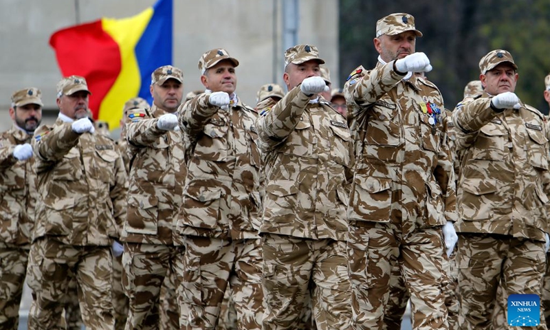 Soldiers march during a military parade celebrating Romania's National Day in Bucharest, Romania, on Dec. 1, 2024. Photo: Xinhua