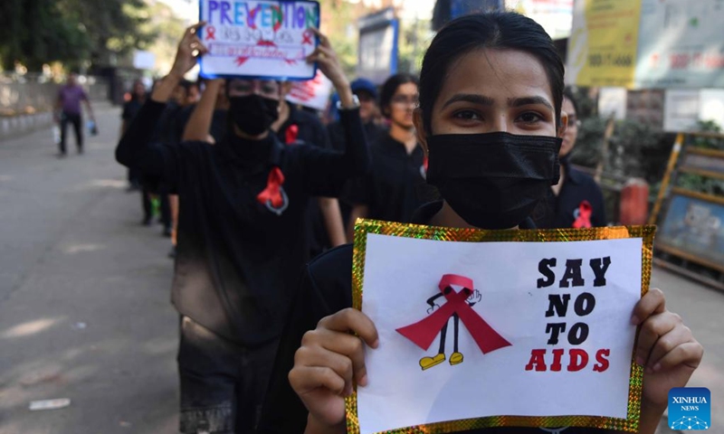 Students hold placards as they attend an awareness rally on the occasion of World AIDS Day in Guwahati city of India's northeastern state of Assam, Dec. 1, 2024. Photo: Xinhua